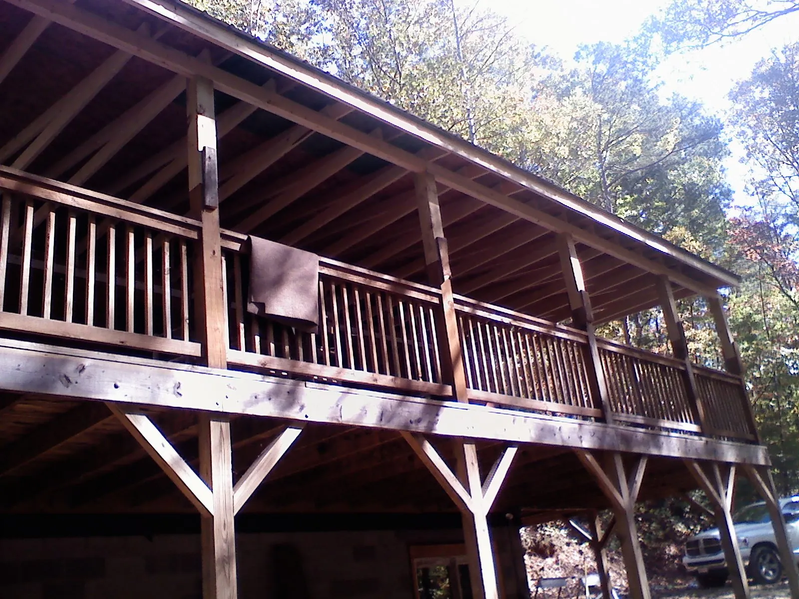 Timber framing under a new elevated porch and deck — Roof Leak Repair in Holiday by Roofing Brothers